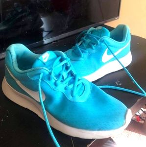 Baby blue Nike shoes